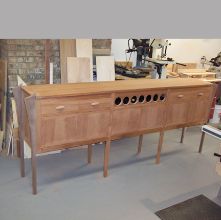 Custom buffet with space for wine.  Fits perfectly in the home.